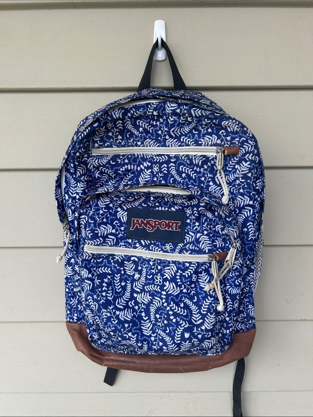 JanSport Blue and White Leaf Print Backpack with Brown Base